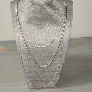 Long, silver 3 tier chain